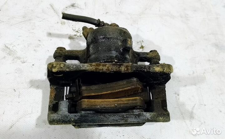 Суппорт тормозной задний левый 2006-2013 Suzuki SX