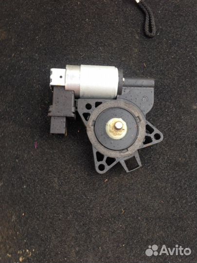 Моторчик стеклоподъемника Mazda