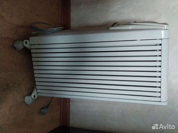 Масляный обогреватель delonghi