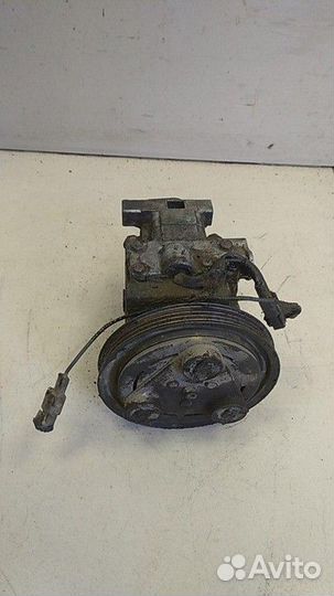 Компрессор кондиционера Mazda Familia