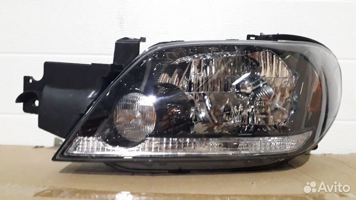 Фара левая Mitsubishi Outlander