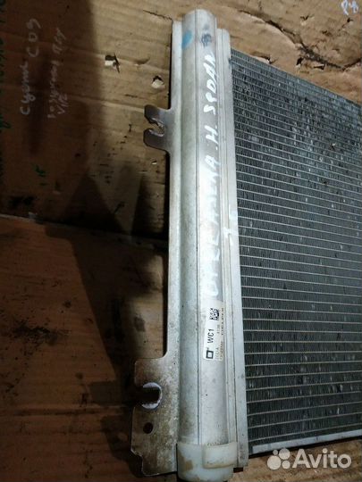 Радиатор кондиционера Opel Astra