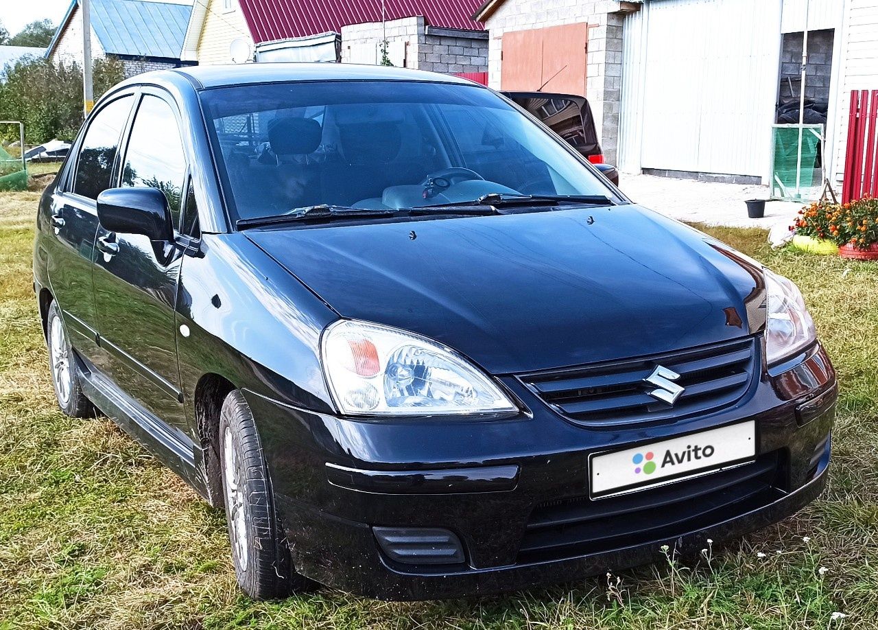 Suzuki Liana: фото владельца