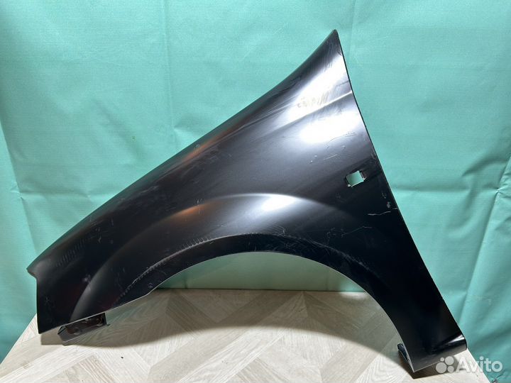 Крыло левое Renault Logan 1 (04-16)