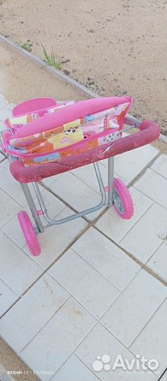 Игрушечная коляска для кукол