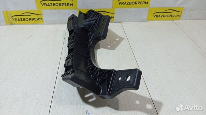 Кронштейн фары левый Subaru Forester S12