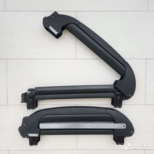 Дуги багажника и крепление лыж thule
