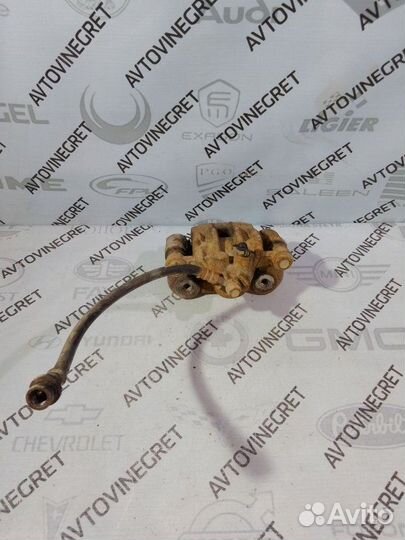 Суппорт тормозной задний Kia Cerato 1