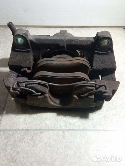 Суппорт тормозной передний левый Renault Laguna 2