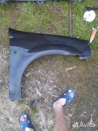 Крыло на renault logan 1