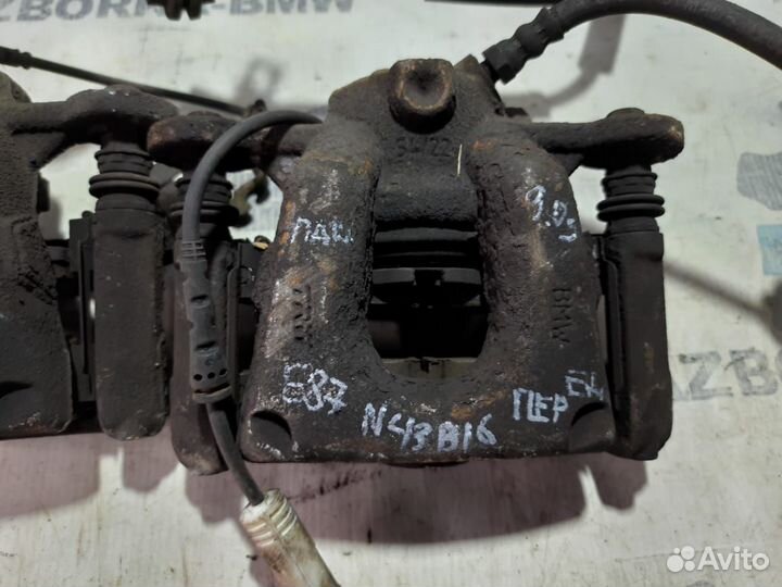 Суппорт тормозной передний левый правый BMW 1-сери