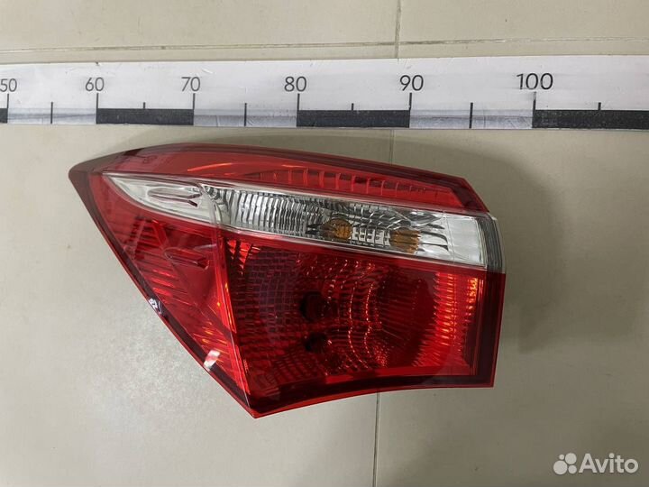 Фонарь задний наружный левый Toyota Corolla E180 2