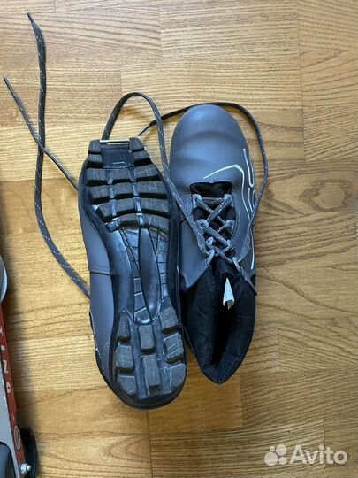 Ботинки лыжи и лыжероллеры