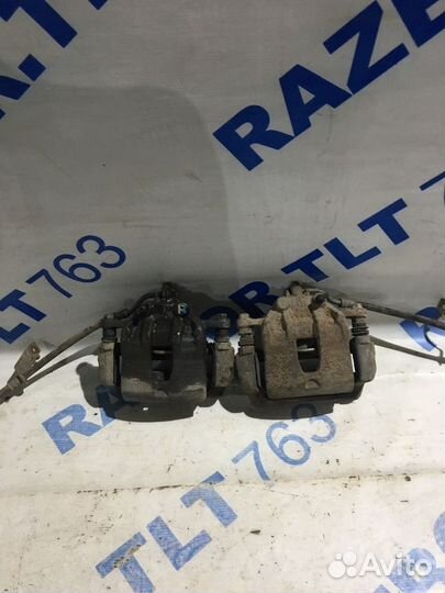 Суппорт передний прав. KIA RIO 3 1.4 мт хетчбек