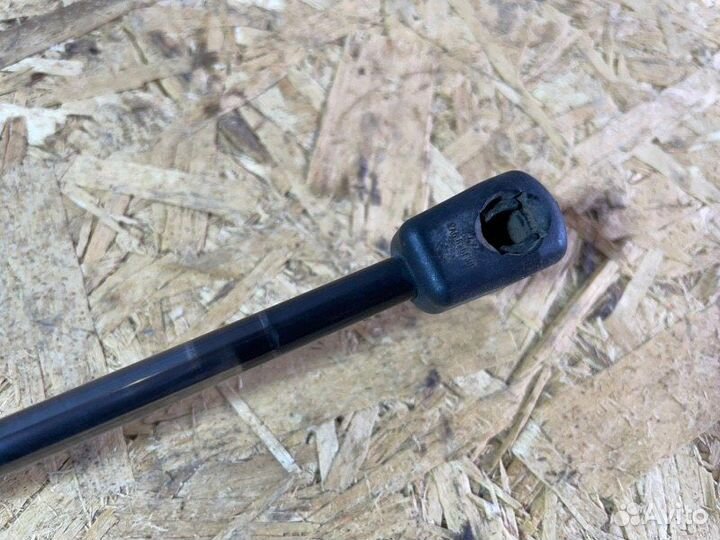 Амортизатор двери багажника задний левый Renault