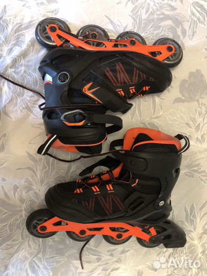 Роликовые коньки