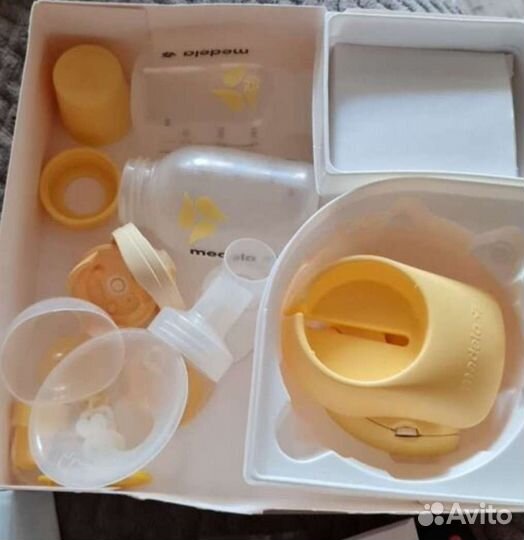 Молокоотсос medela электрический