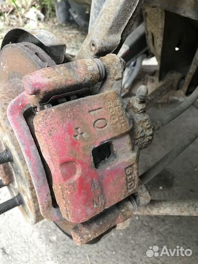 Суппорт задний правый Mitsubishi Galant 8 2.4i