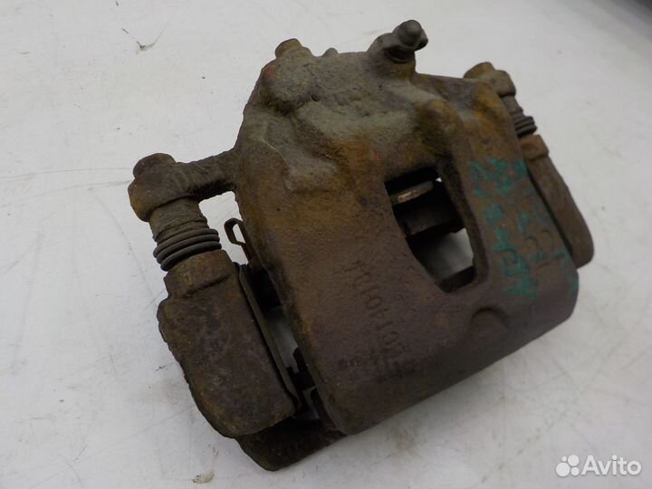 Суппорт тормозной передний левый на Kia Rio