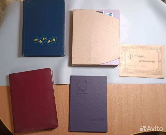 Три небольших альбома с марками и мелочи