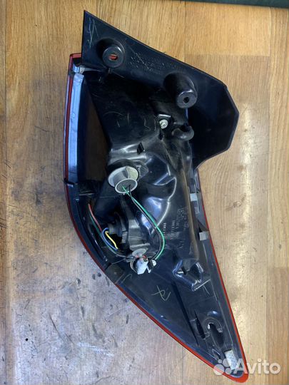 Фонарь стоп сигнал задний левый mazda 2 dj