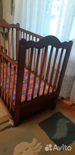Кроватка детская с поперечным маятником