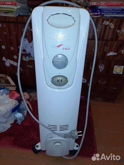 Масляный обогреватель delonghi 082063