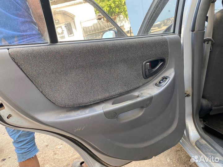 Обшивка задней левой двери Hyundai Accent Tagaz