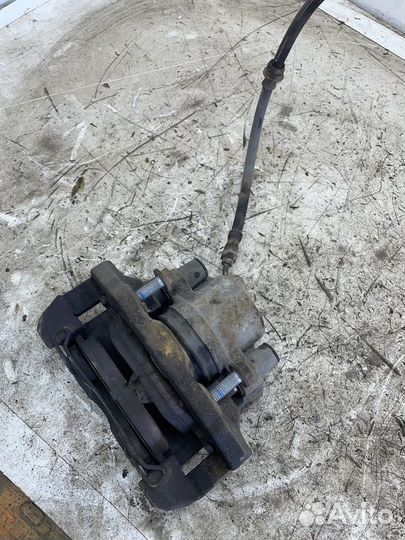 Суппорт тормозной передний левый Ford Fusion