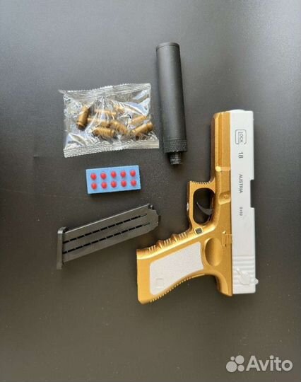 Пистолет игрушечный с пульками