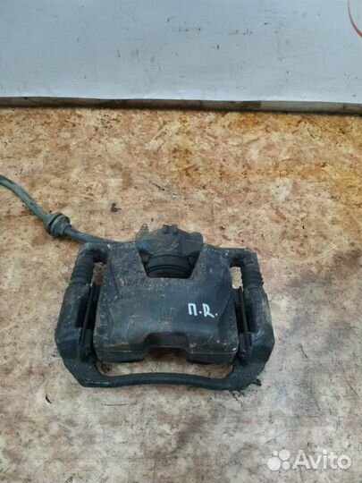 Суппорт тормозной передний правый Opel Astra J