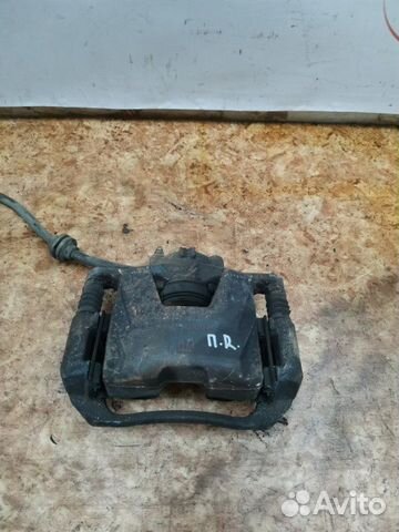 Суппорт тормозной передний правый Opel Astra J