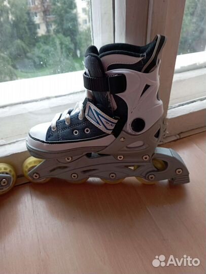 Роликовые коньки