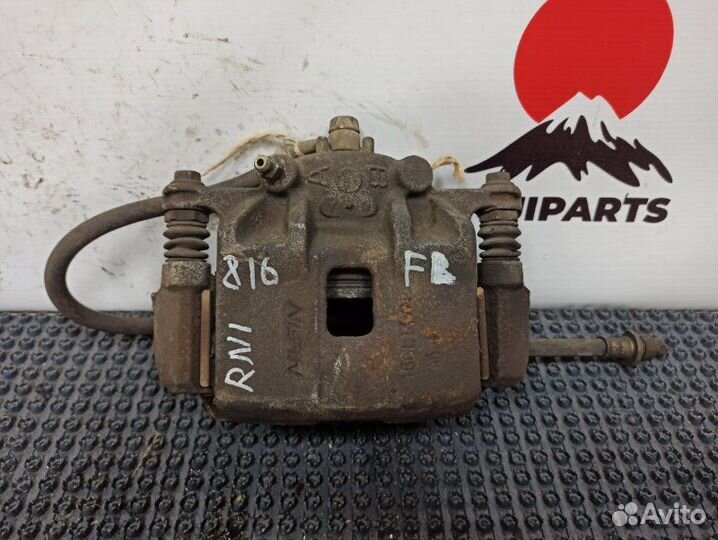 Суппорт тормозной передний левый Honda Stream RN1