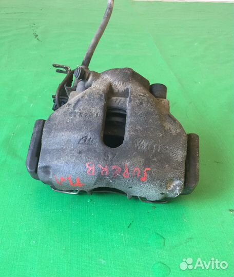 Суппорт тормозной перед левый Шкода Superb 2001-06