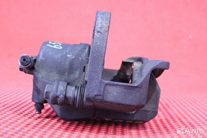 Суппорт тормозной передний левый Hyundai Tucson JM