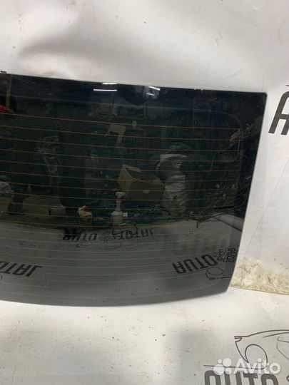 Стекло заднее Renault Logan K7J710 2008