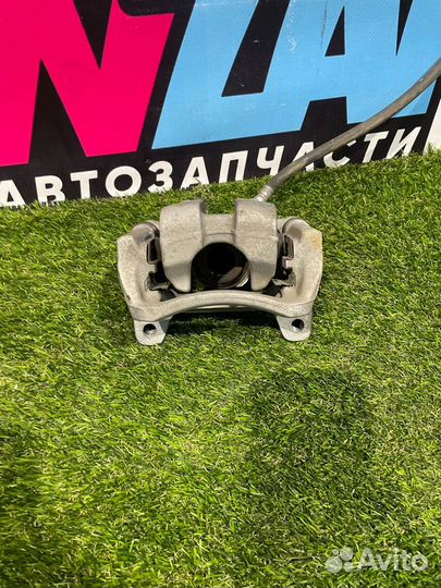 Суппорт тормозной задний левый Buick Encore GX