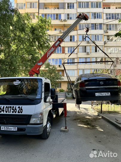 Эвакуация автомобиля с траверсой