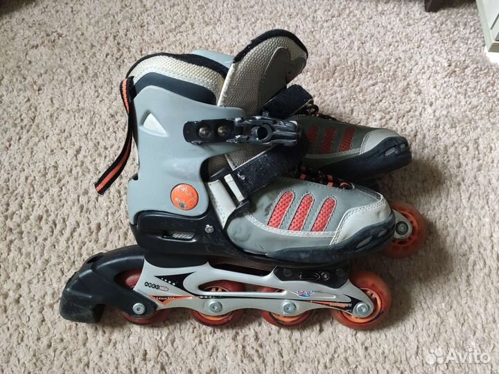 Роликовые коньки