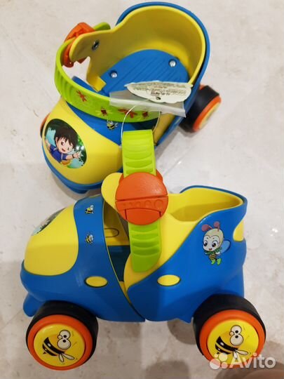 Роликовые коньки новые + защита