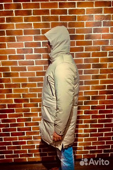 Зимний мужской пуховик бежевого цвета от Stone Island