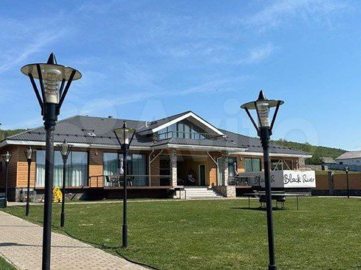 Дом 450 м² на участке 15 сот.