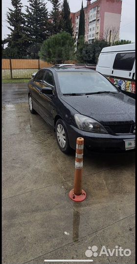 Mitsubishi Lancer 1.6 AT, 2006, 250 000 км