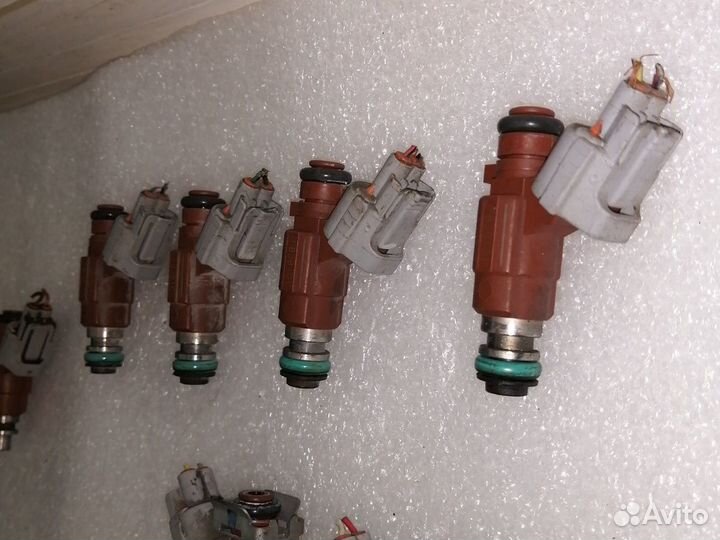 Топливная форсунка QG18DE