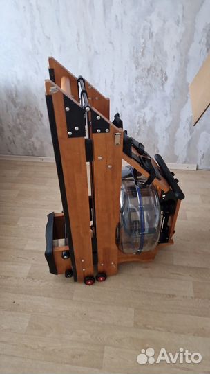 Гребной тренажер новый