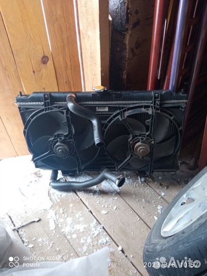 Nissan Almera N16 радиатор с дифузором