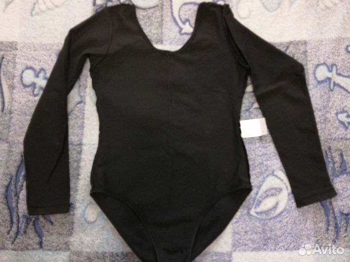 Гимнастические костюмы и пачки