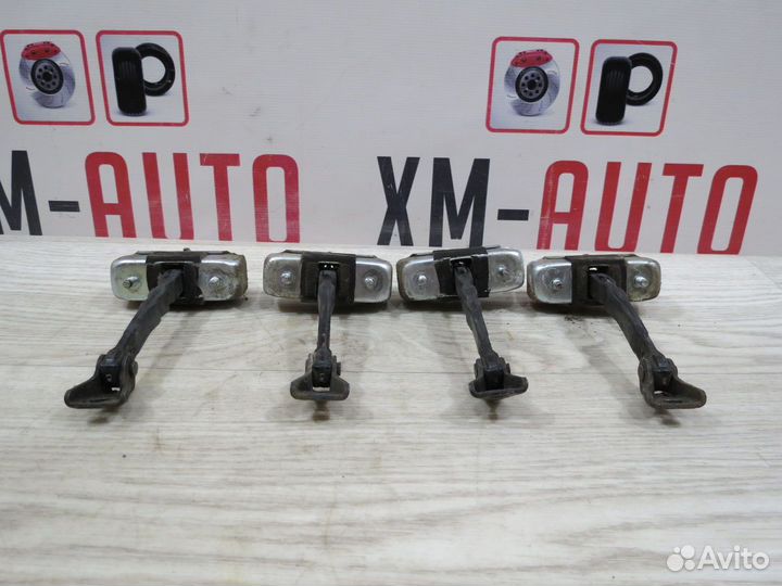 Ограничитель двери задние Toyota Corolla 150