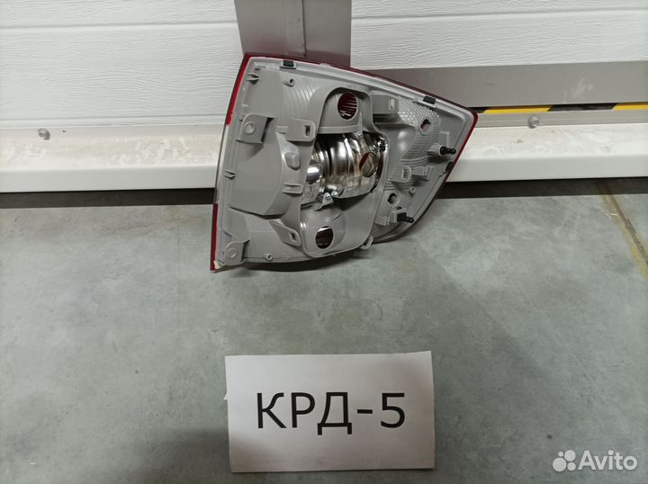 Фонарь левый Skoda Rapid 2012